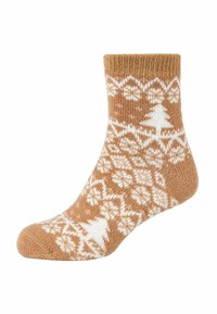 Beige gestrickte Socken mit einem weißen Schneeflocken- und Baum-Muster, mit einem gerippten Bündchen und weicher Textur, bis zur Mitte der Waden.