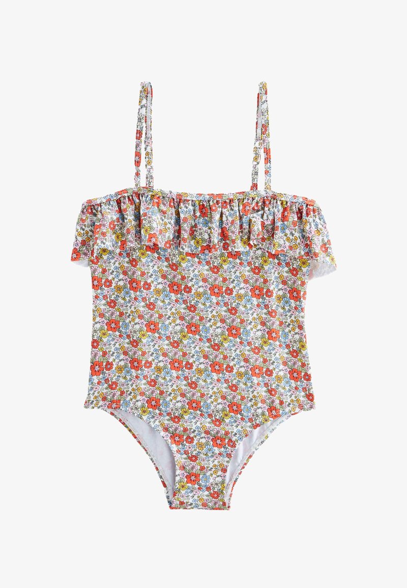 Maillot de bain une pièce floral avec encolure à volant épaules dénudées. Présente des fleurs rouges, bleues et jaunes vives sur un fond blanc.