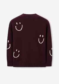 Donkerpaarse gebreide trui met witte glimlachgezichten verspreid over de achterkant en mouwen, geribbelde boorden en zoom, ronde hals.