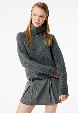 - Sweter