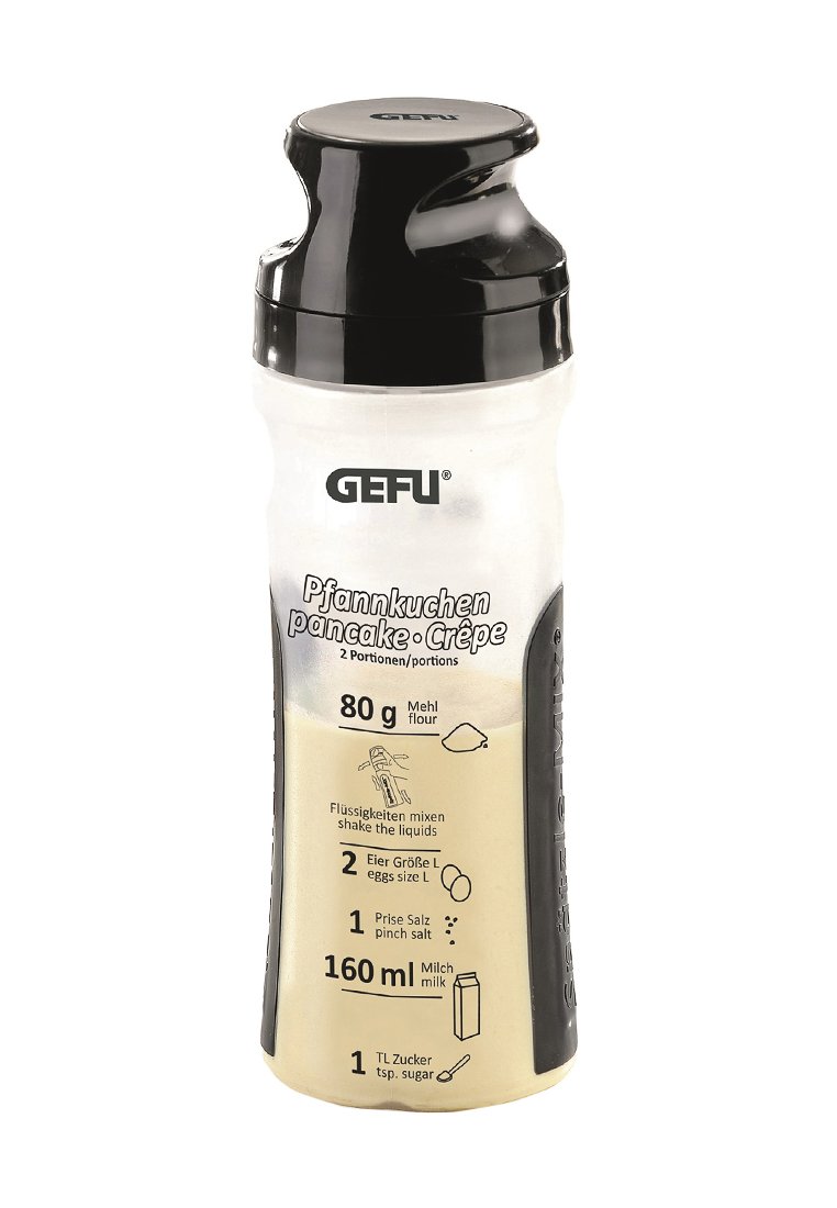 Bouteille mélangée à pancakes en plastique transparent avec un couvercle noir. Dispose de repères de mesure et d'icônes pour la farine, le lait, les œufs, le sel et le sucre.
