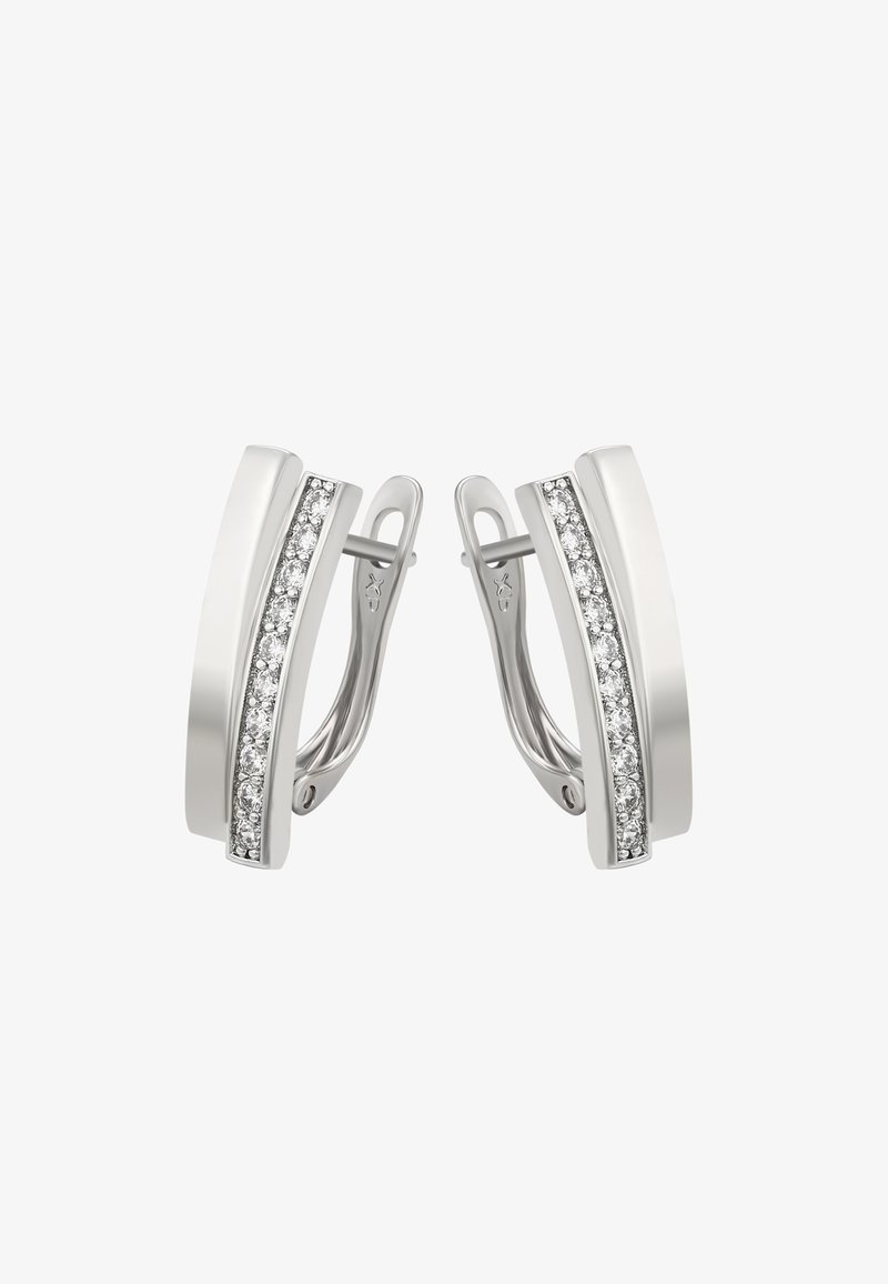 Hopeakoruine, joissa on kaareva, kiiltävä muotoilu ja keskellä rivi pieniä kirkaita kivitä. Suorapintainen rakenne ja suljenta.