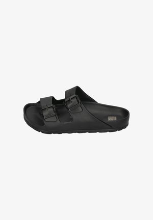 Black rubber slide sandal with two adjustable straps featuring metallic buckles, molded footbed, and textured sole for grip.