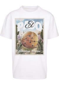 T-shirt en coton blanc avec un graphique coloré d'un ballon de basket et d'un paysage désertique avec des cactus, étiqueté "Champ de tir d'El Paso."