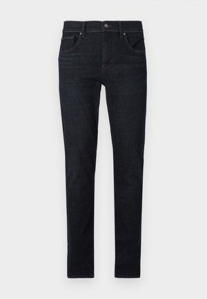 Jeans in denim scuro con una vestibilità slim, dotati di cinque tasche, chiusura con bottone e cuciture a contrasto. Il tessuto ha una superficie liscia.