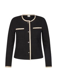 Schwarze strukturierte Jacke mit Rundhalsausschnitt, beigem Besatz, zwei Fronttaschen und silbernen Knöpfen in der Mitte. Lange Ärmel.