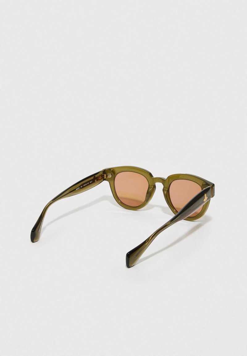 Olive green sunglasses with a rounded cat-eye shape, pink tinted lenses, and smooth plastic frames. Features slender black accents on the temples.