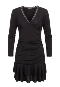 Schwarzes Kleid aus weichem Stoff mit langen Ärmeln, V-Ausschnitt mit Spitzenbesatz und gerafftem Saum. Glatte Textur mit figurbetontem Schnitt.