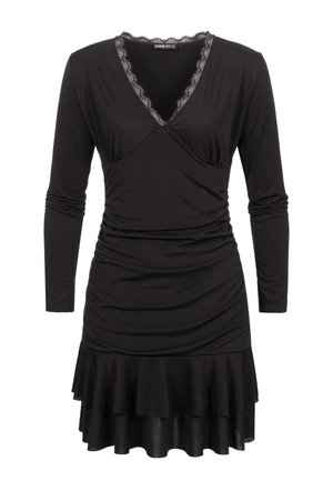 Czarna sukienka wykonana z miękkiego materiału, z długimi rękawami, dekoltem w kształcie litery V ozdobionym koronką oraz falbanianym dołem. Gładka faktura i dopasowany fason.