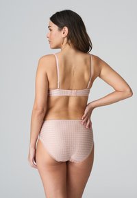 Pink bra and high-waisted brief set featuring a textured, grid pattern. Adjustable straps and a hook-and-eye closure on the bra.