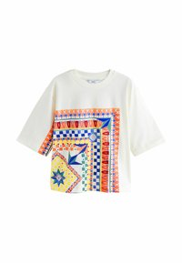 White oversized short-sleeve shirt featuring a multicolored geometric and floral square pattern on the front and left sleeve.