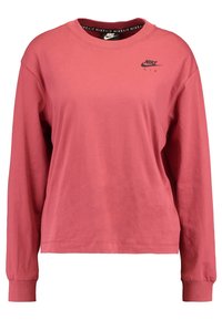Röd långärmad bomulls-T-shirt med rund halsringning, med en liten svart Nike Air-logotyp på bröstet och ribbad mudd.