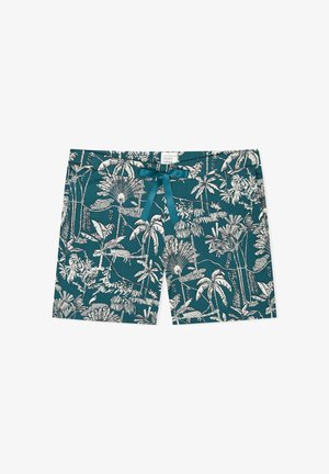 Teal shorts with white tropical plant and animal print featuring jaguars and palm trees, finished with a teal ribbon drawstring at the waist.