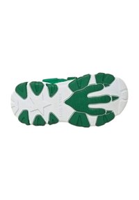 Sole della scarpa con una base prevalentemente bianca e dettagli in gomma verde, modelli testurizzati e un emblema a stella, progettata per la trazione.