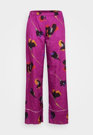 Paarse bloemenprintbroek met een elastische tailleband, voorzien van grote zwarte en oranje bloemenpatronen en witte accenten aan de zoom.