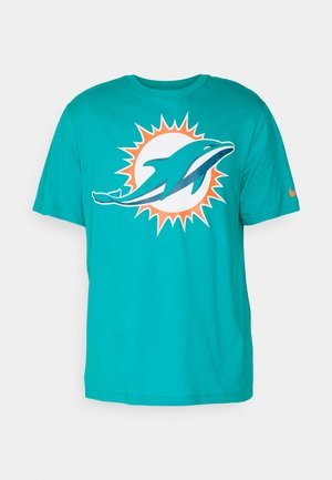 Teal cotton t-shirt featuring a graphic of a dolphin over an orange sunburst. Short sleeves and a crew neck design. Nike logo on sleeve.