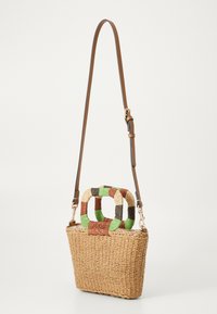 Woven straw bag with a rectangular shape, brown leather strap, and dual colorful handles in green, brown, and cream. Textured surface.