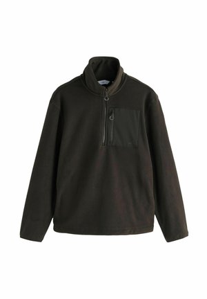 Vilnas džemperis tumši olīvu zaļā krāsā ar augstu apkakli, rāvējslēdzēju priekšpusē un krūšu kabatu ar rāvējslēdzēju. Mīksta tekstūra, vaļīgs piegriezums.