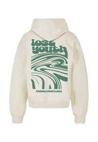 Sudadera color crema con un diseño gráfico verde que presenta el texto "juventud perdida" y líneas onduladas. Tejido suave y puños acanalados.