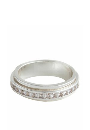 Silver ring with a row of clear square-cut stones set in a channel along the outer surface, shown on a white background.