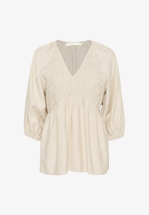 Lys beige bluse med V-hals, smock-detaljer på bodicen, og trekvartærmer med samlede manchetter. Blødt, tekstureret stof.