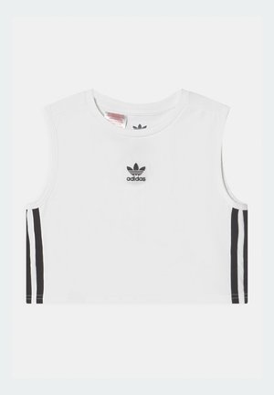Hvid ærmeløs Adidas crop top med sort logo centreret på brystet og to sorte lodrette striber på hver side.