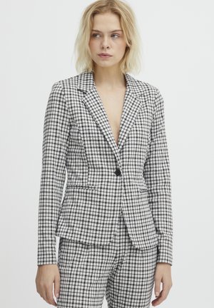 Gestreifter Blazer in Schwarz und Weiß, taillierte Passform, Ein-Knopf-Verschluss, Reverskragen, Fronttaschen, prägnante Stoffstruktur.