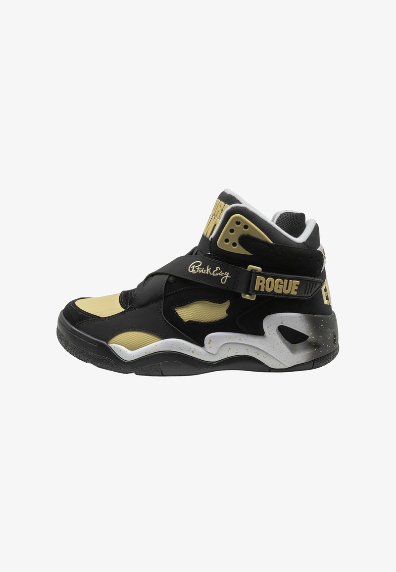 Basket montante noire et beige avec semelle blanche tachetée, bride étiquetée « ROGUE » et détails du logo dorés sur le côté et la languette.