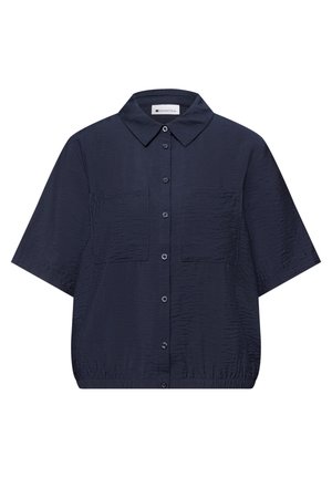 Chemise boutonnée bleu marine à manches courtes avec col, deux poches poitrine et ourlet élastique à la taille.