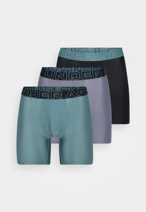 A set of three pairs of men's boxers in teal, gray, and black. Each features an elastic waistband with "UNDER ARMOUR" printed in bold letters.