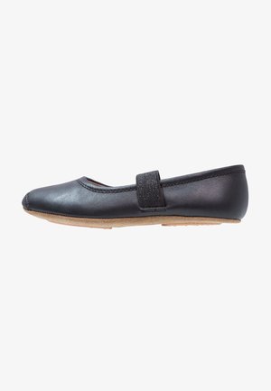 Black leather ballet flat with a single elastic strap across the top and a soft, tan suede sole.