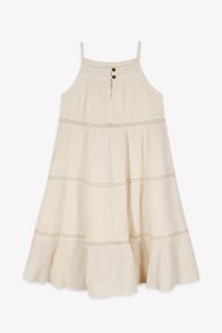 Cream sundress with thin straps, featuring a buttoned keyhole neckline, textured fabric, and tiered ruffles at the hem.