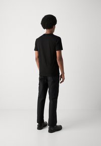 Antony Morato REGULAR FIT FLOCK AND INJECTION PRINT - Camiseta estampada - black