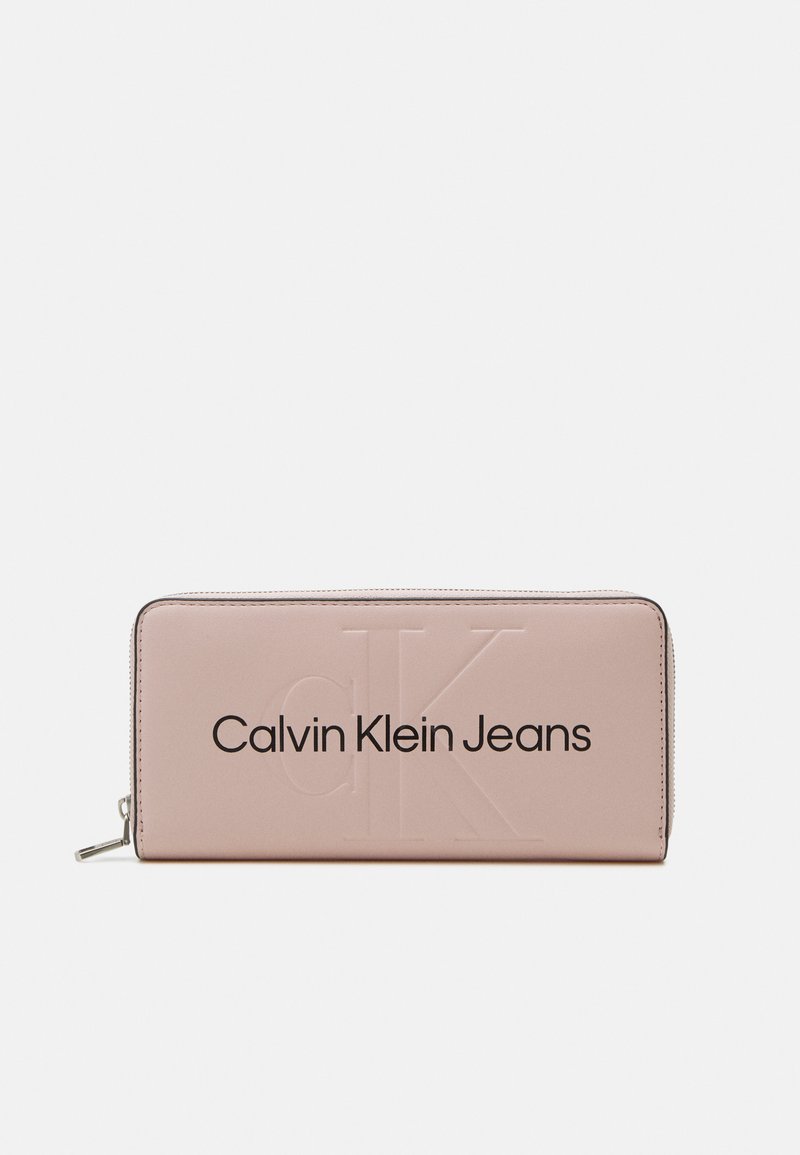 Calvin Klein Jeans SCULPTED ZIP AROUND MONO - Peňaženka - pale conch