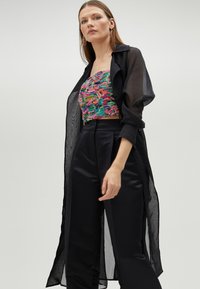 LOLA CASADEMUNT Kišni ogrtač - black