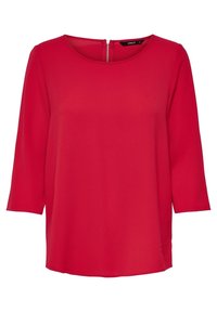Blouse rouge avec un col rond, manches 3/4 et une fermeture éclair au dos. Confectionnée en tissu lisse avec une coupe décontractée.