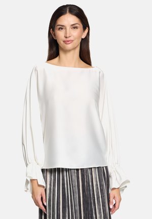 MIT U-BOOT-AUSSCHNITT - Blouse - rohweiß