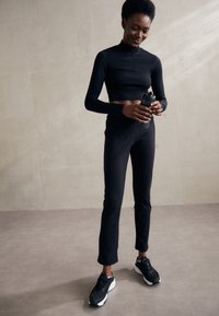 Champion ICONS DRAWSTRING PANTS - Pantalon de survêtement - black