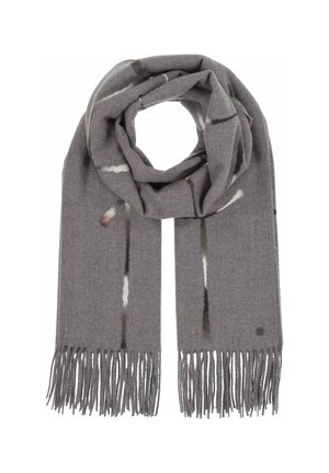 Écharpe en laine grise avec des motifs abstraits subtils, des extrémités à franges et une petite étiquette métallique circulaire près d'un bord.