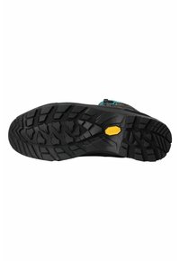 Schwarze Wanderschuhsohle mit tiefen Profilrillen; verfügt über das gelbe Vibram-Logo. Enthält strukturierten Gummi für Grip und Langlebigkeit, um Traktion zu gewährleisten.