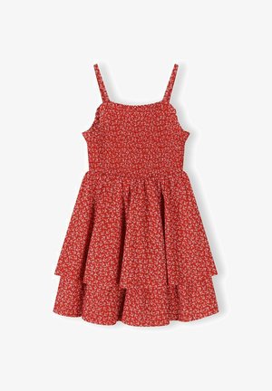 Red sleeveless smocked dress with thin straps and small white floral pattern, featuring a tiered skirt design.