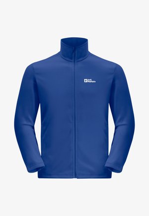 Blauwe fleecjas met een hoge kraag, rits aan de voorkant en lange mouwen. Heeft een klein wit logo op het linkere borstgebied.