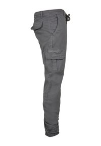 Grijze katoenen cargobroek met een elastische tailleband, zij- en cargozakken, en elastische boorden bij de enkels. Gladde textuur en pasvorm.