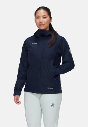 Marineblaue wasserdichte Jacke mit Kapuze, aus GORE-TEX-Material gefertigt, mit einem Frontreißverschluss, elastischen Bündchen und Logodetails.