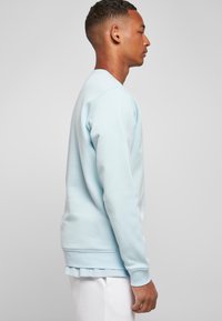 Starter ESSENTIAL CREWNECK - Sweatshirt - icewaterblue