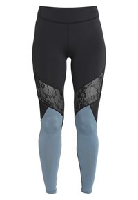 Leggings a vita alta in nero e azzurro chiaro, con un design a pannello in pizzo, texture liscia e silhouette aderente.