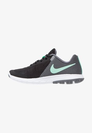 Chaussure de course Nike noire et grise avec un swoosh vert menthe, une semelle blanche et des lacets noirs, montrée de profil sur un fond blanc.