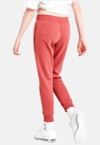 Nike Sportswear Träningsbyxor - red