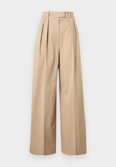 High-waist beige wide-leg trousers with front pleats and belt loops, displayed against a plain white background.