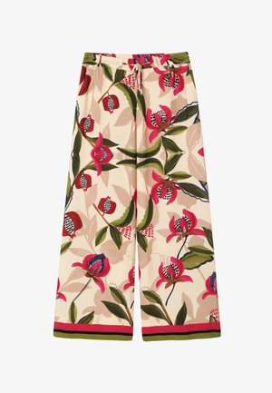Wide-leg cream trousers with red, pink, and green floral print, elastic waistband, and drawstring, featuring a red and green striped hem.